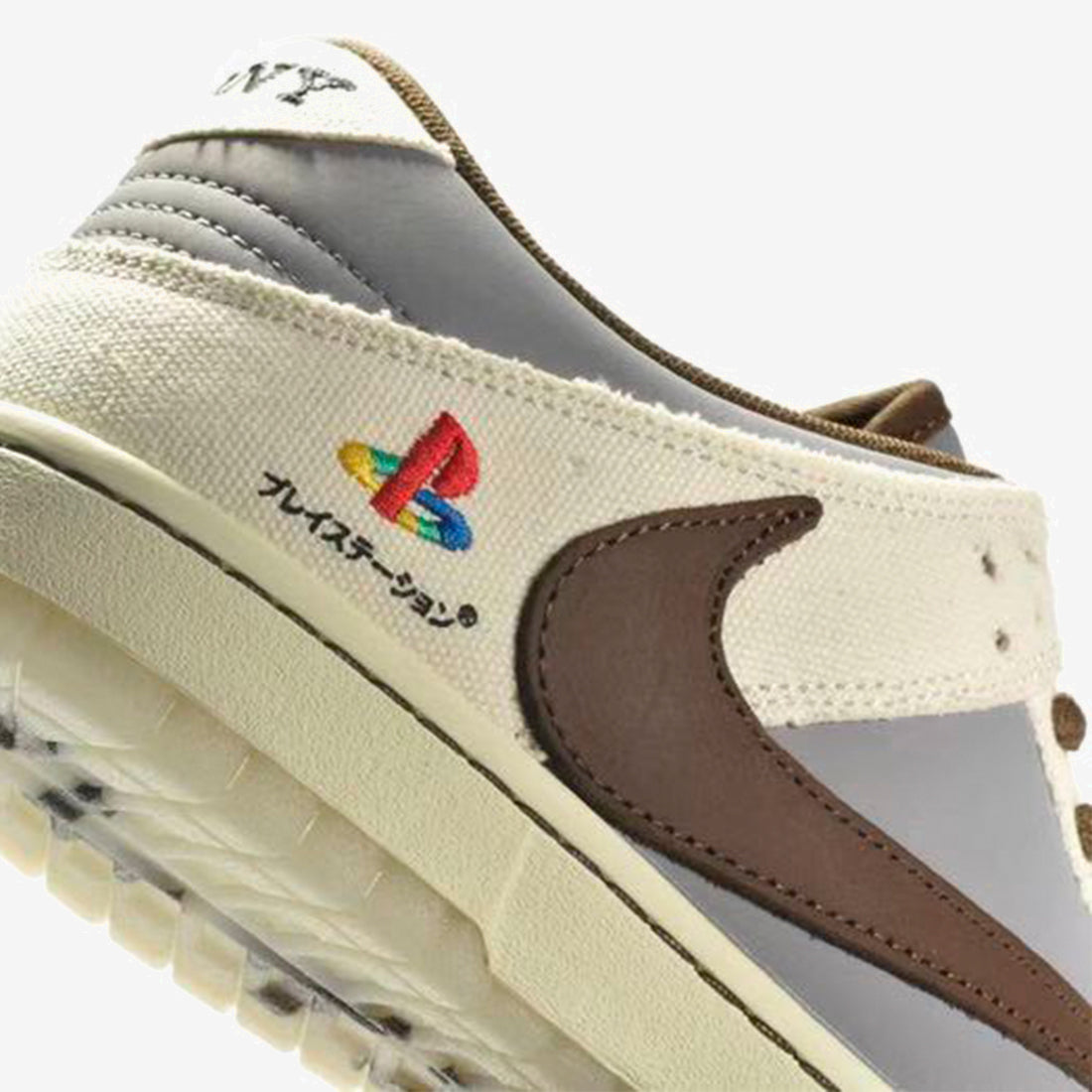 SB DUNK LOW PLAYSTATION X TRAVIS SCOTT